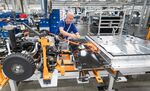 An employee of Volkswagen Sachsen in Zwickau wires a battery on the&nbsp;line for the new VW ID.3 on February 25, 2020 in Zwickau, Germany.