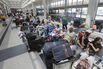 Travelers await flights at Beirut International Airport on Aug. 5.