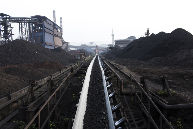 Coal moves along a conveyor at a plant in Raigarh, Chhattisgargh, India.