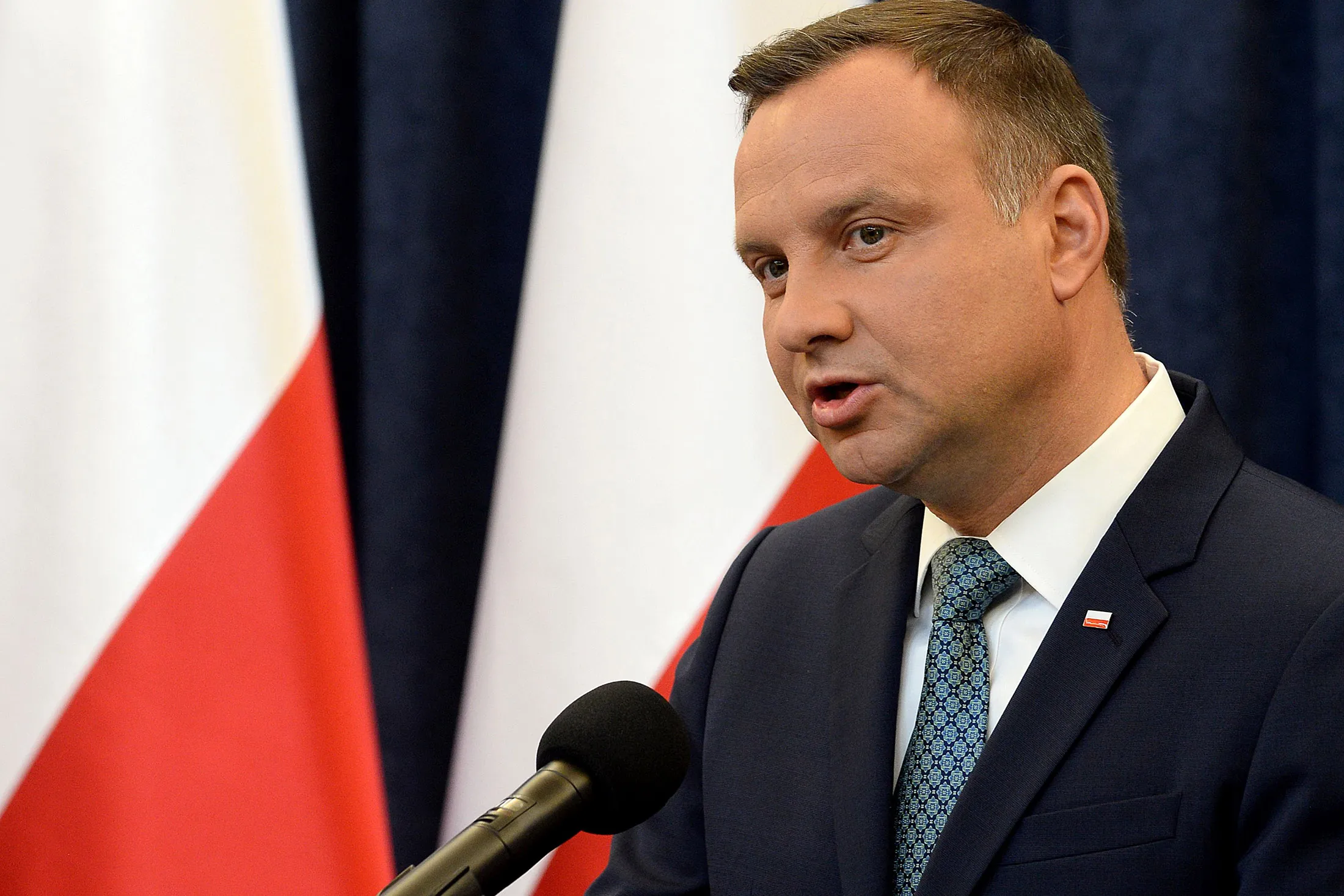 Polish President Andrzej Duda makes a statement to announce that he will veto controversial judicial reforms in Warsaw on July 24, 2017. The planned reforms, that would have increased political control over the judiciary, had prompted huge street protests and threats of unprecedented EU sanctions. / AFP PHOTO / JANEK SKARZYNSKI (Photo credit should read JANEK SKARZYNSKI/AFP/Getty Images)
