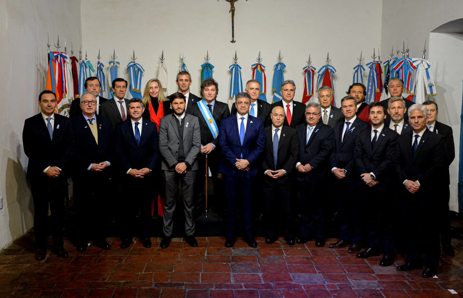 This handout picture released by the Argentine Presidency shows Javier Milei (C) attending a political meeting to sign the 'Pacto de Mayo' with governors&nbsp;in Tucuman, Argentina on July 8.