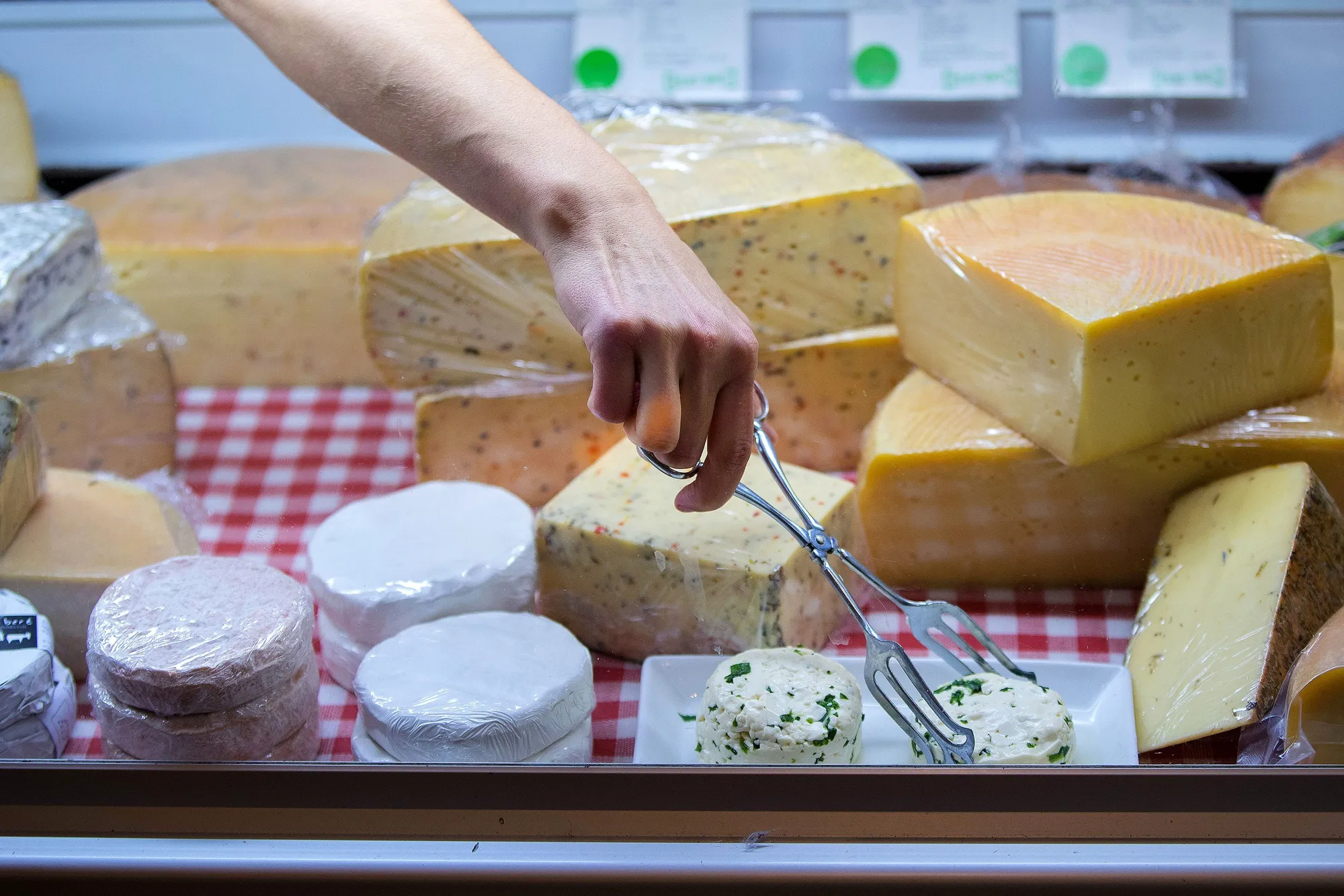 A cheese display at a dairy farm.