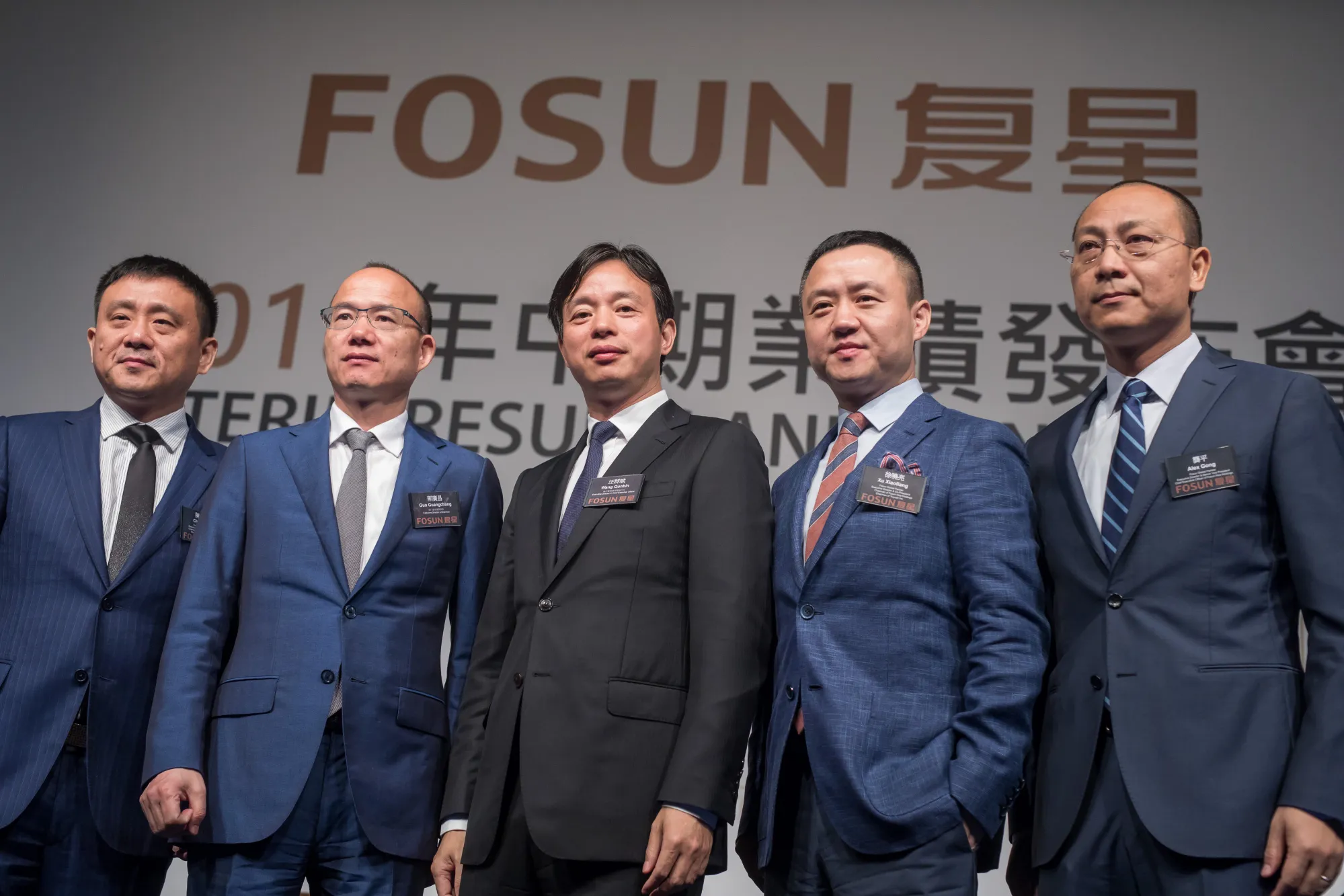 Chen Qiyu, from left, Guo Guangchang, Wang Qunbin, Xu Xiaoliang, and Gong Ping during a news conference in Hong Kong.
