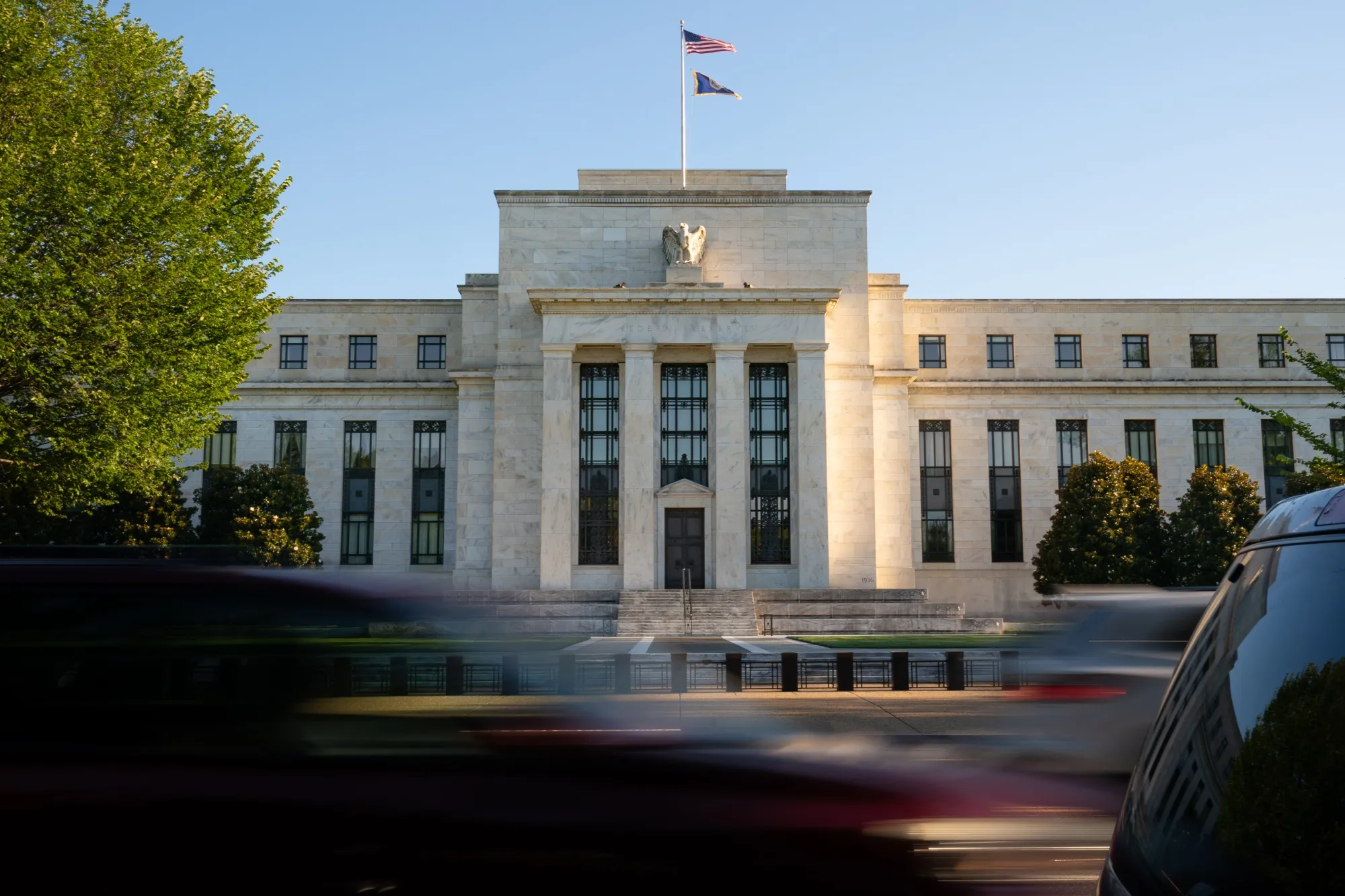 Traffic passes the Marriner S. Eccles Federal Reserve building in Washington, DC.