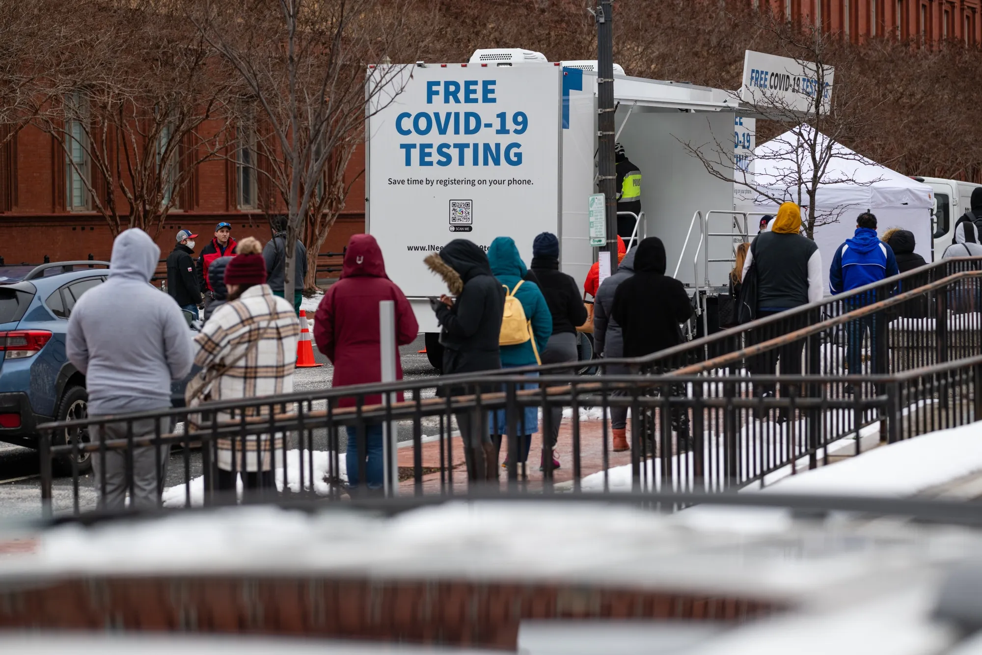 Residents stand in a line at a Covid-19 testing site&nbsp;in Washington, D.C., U.S., on Jan. 5.