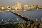 Traffic along a bridge spanning the river Nile, in Cairo, Egypt.