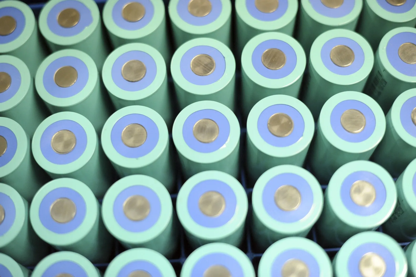 Lithium ion batteries sit on a table at the China BAK Battery Inc. facility in Tianjin, China.