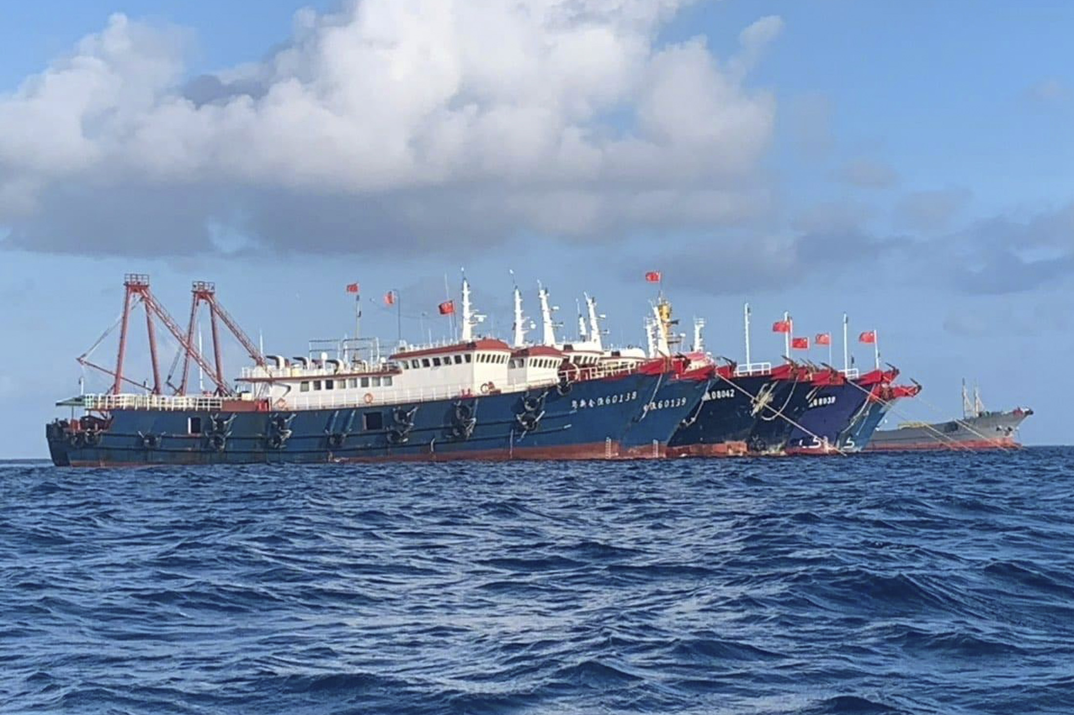 Chinese vessels moored at Whitsun Reef on March 27, 2021.
