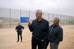 Israeli Defense Minister Benny Gantz, center,&nbsp;along the border with the Gaza Strip near Moshav Netiv HaAsara in southern Israel&nbsp;during an event marking the end of construction of a barrier fully enclosing the Palestinian enclave, on Dec. 7.