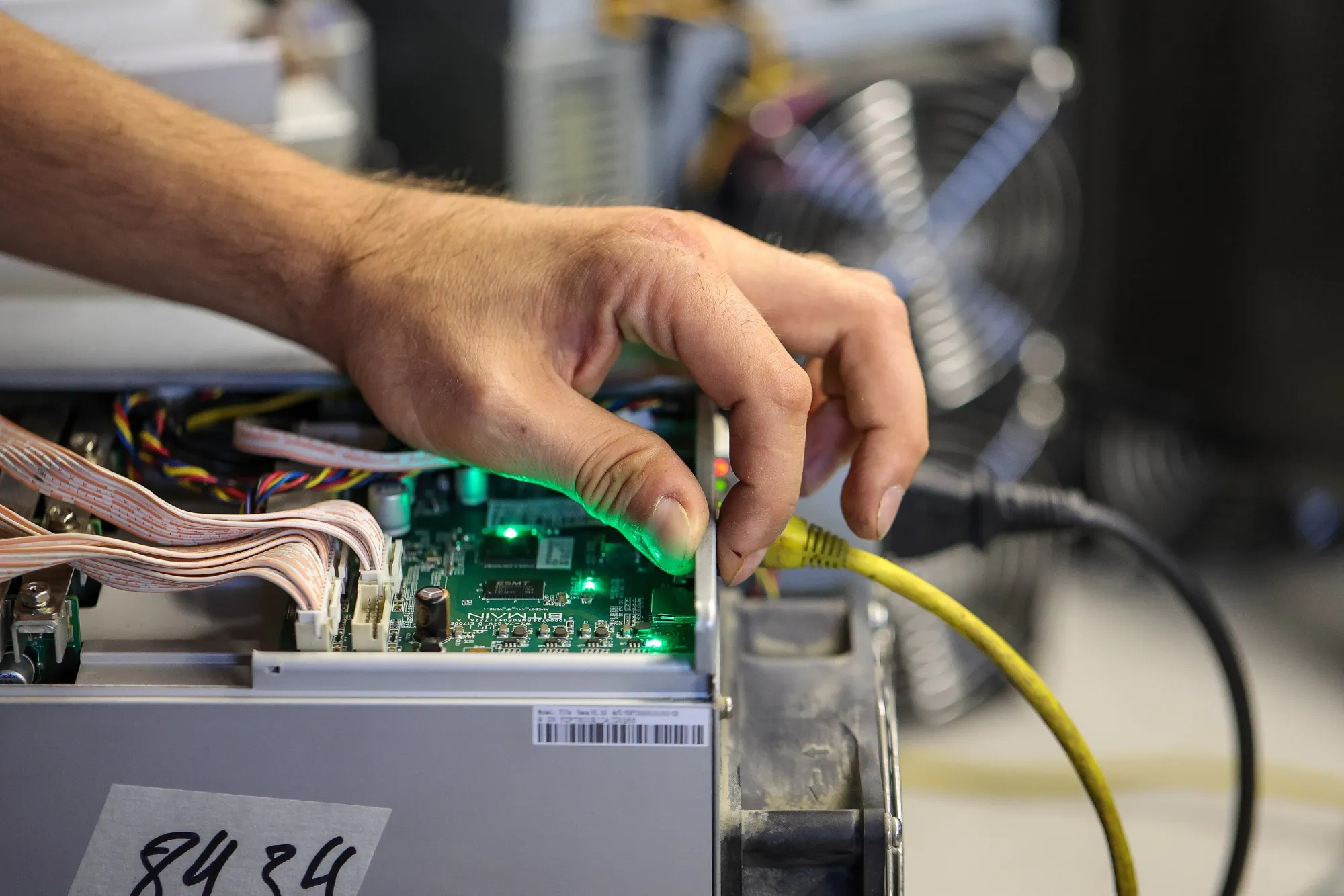 A technician works on a mining rig&nbsp;in Moscow, Russia.