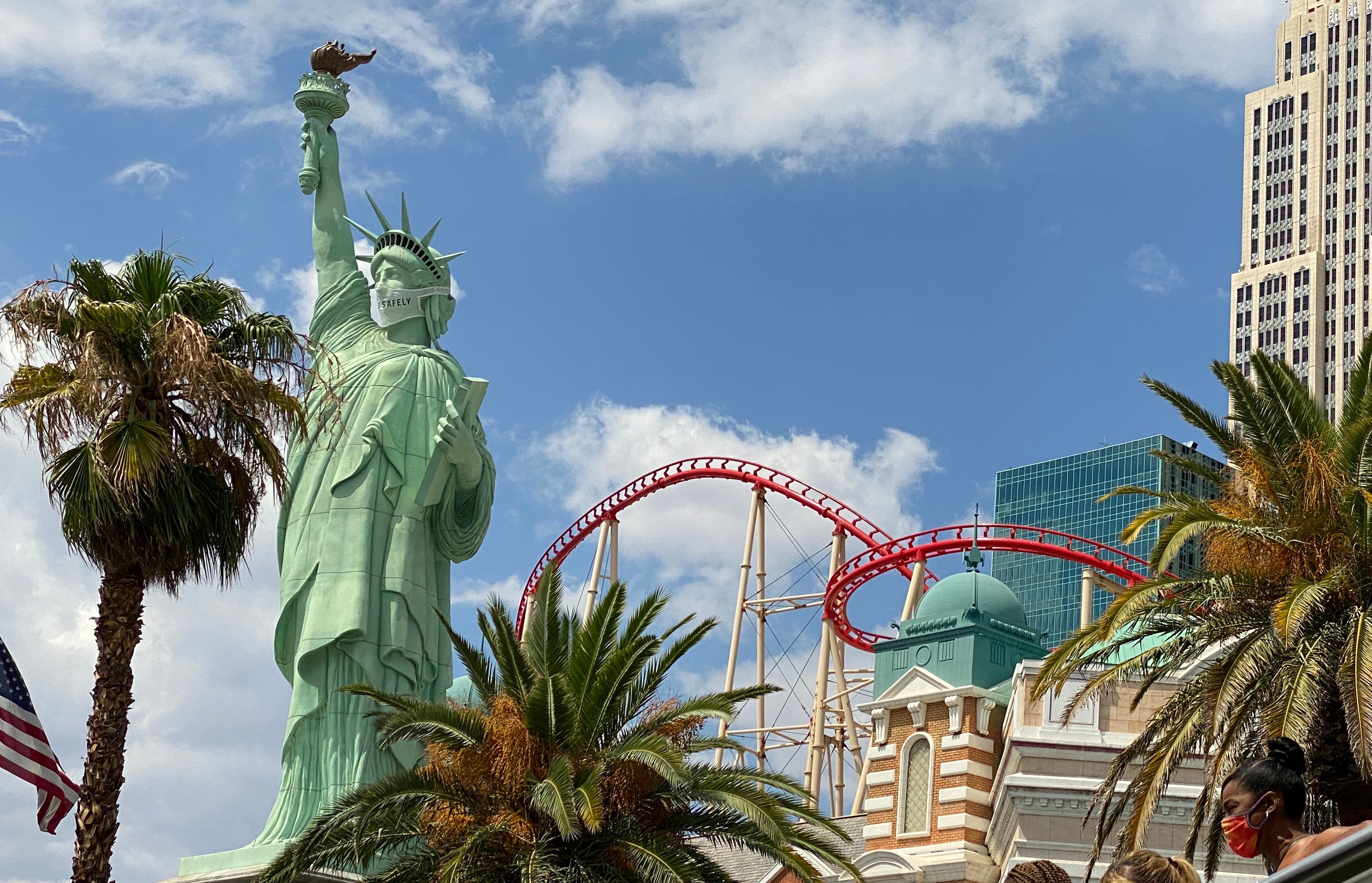 The Statue of Liberty outside of New York-New York sporting a 'Vegas  Safely' mask