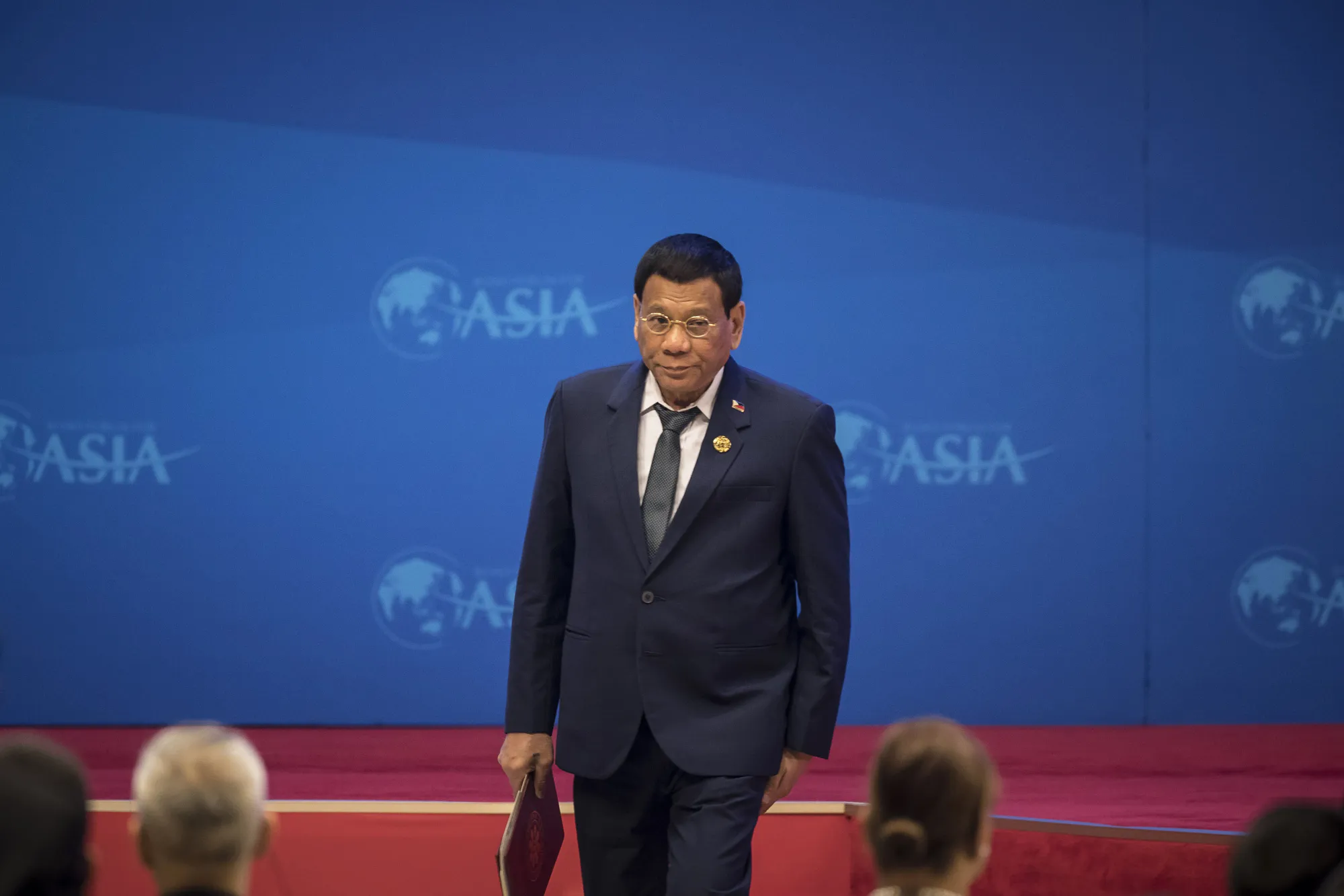 Rodrigo Duterte, the Philippines' president, walks off stage after speaking at the Boao Forum for Asia Annual Conference in Boao, China, on&nbsp;April 10.&nbsp;