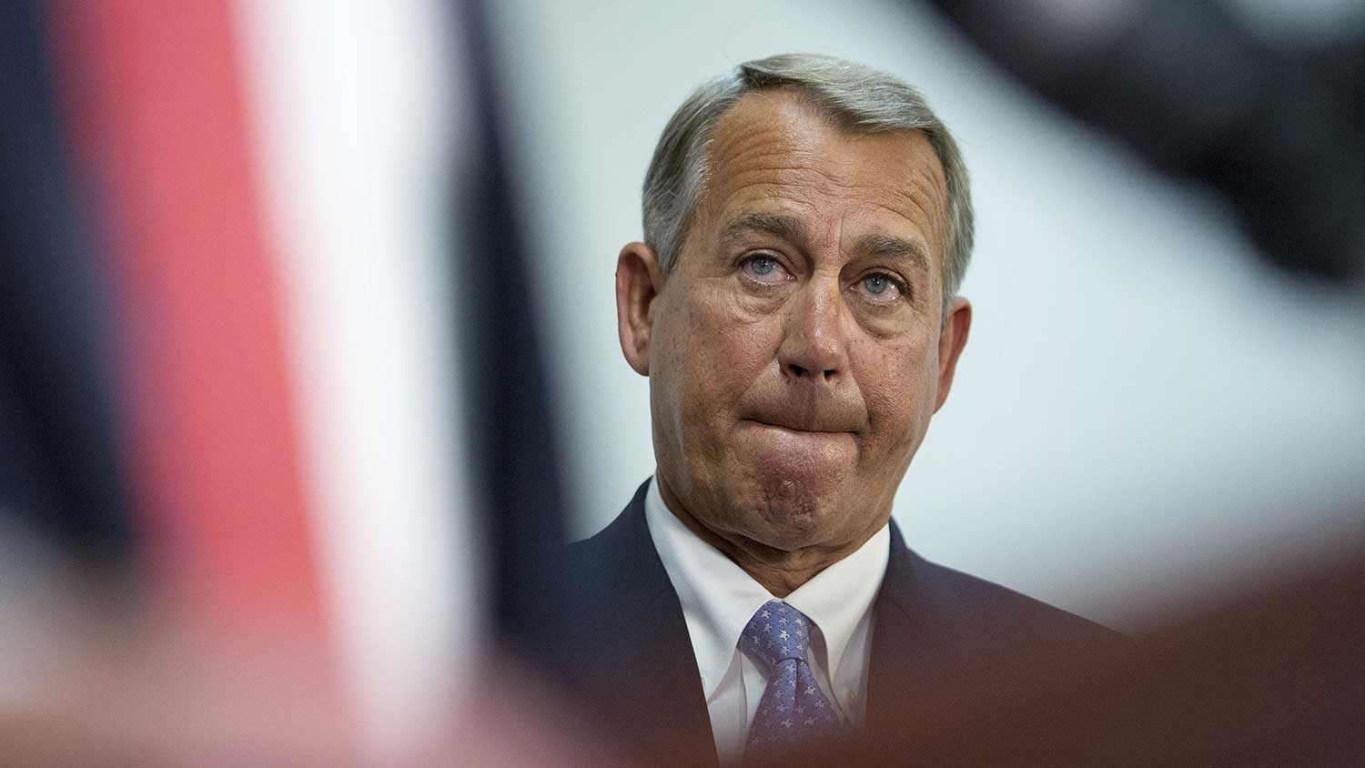 U.S. House Speaker John Boehner, a Republican from Ohio, listens during a news conference after a House Republican Conference meeting at the U.S. Capitol Building in Washington, D.C., U.S., on Tuesday, Dec. 2, 2014.
