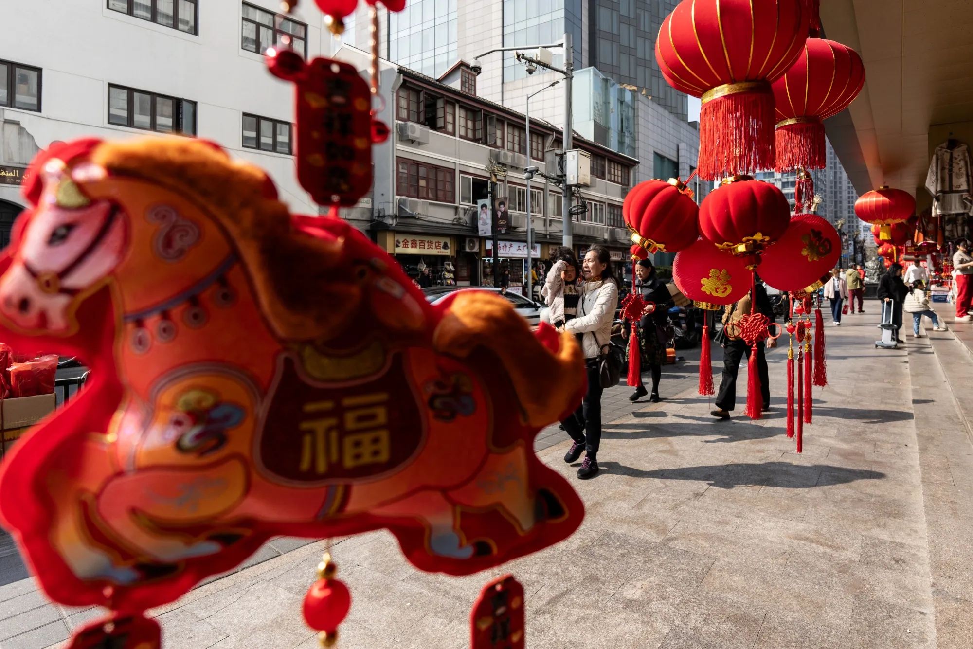 Shoppers at a market ahead of Lunar New Year in Shanghai.