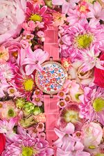 The Lady Arpels Heures Florales Cerisier tells the hour by opening the corresponding number of flowers to reveal the gemstones inside.