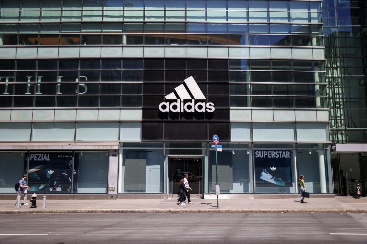 bloomberg.com - Tim Loh - Adidas Lifts Outlook on Robust Demand for Apparel, Sports Gear