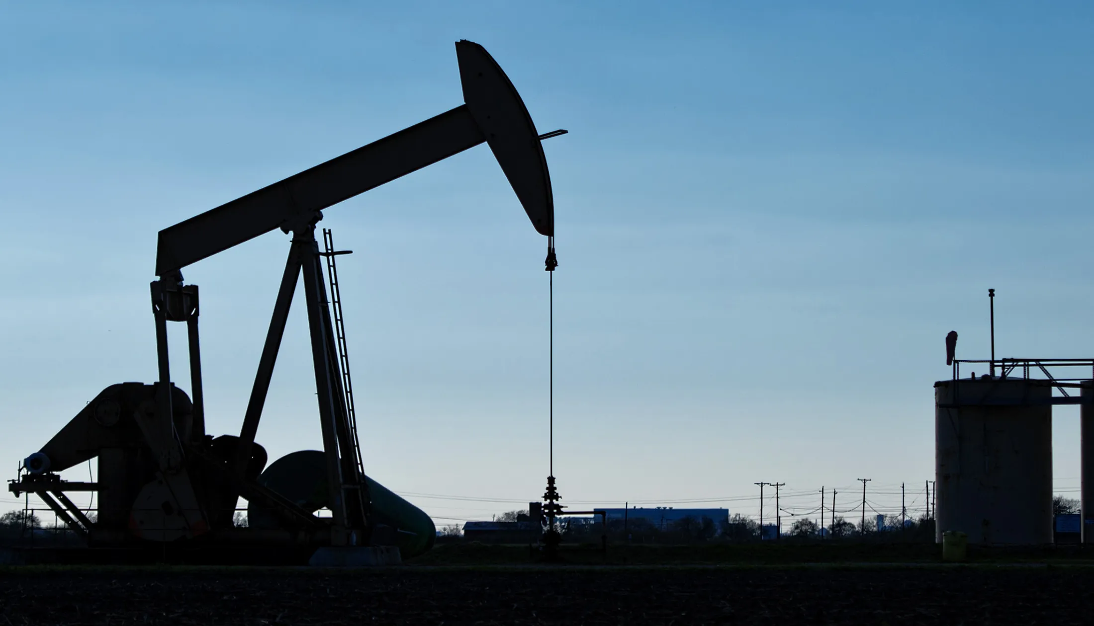 A pump jack operates in an oil field near Corpus Christi, Texas.
