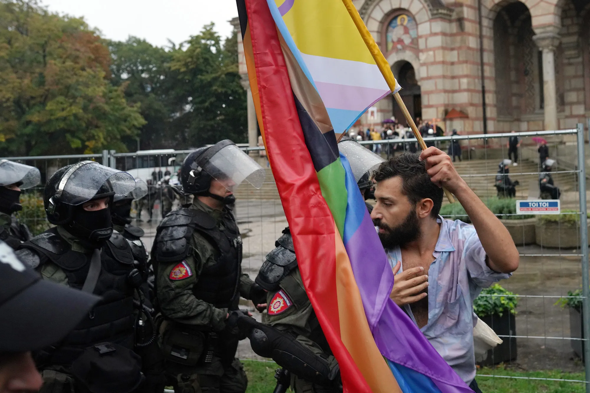A participant at EuroPride is asked by riot police to continue marching, in Belgrade, Serbia.&nbsp;&nbsp;