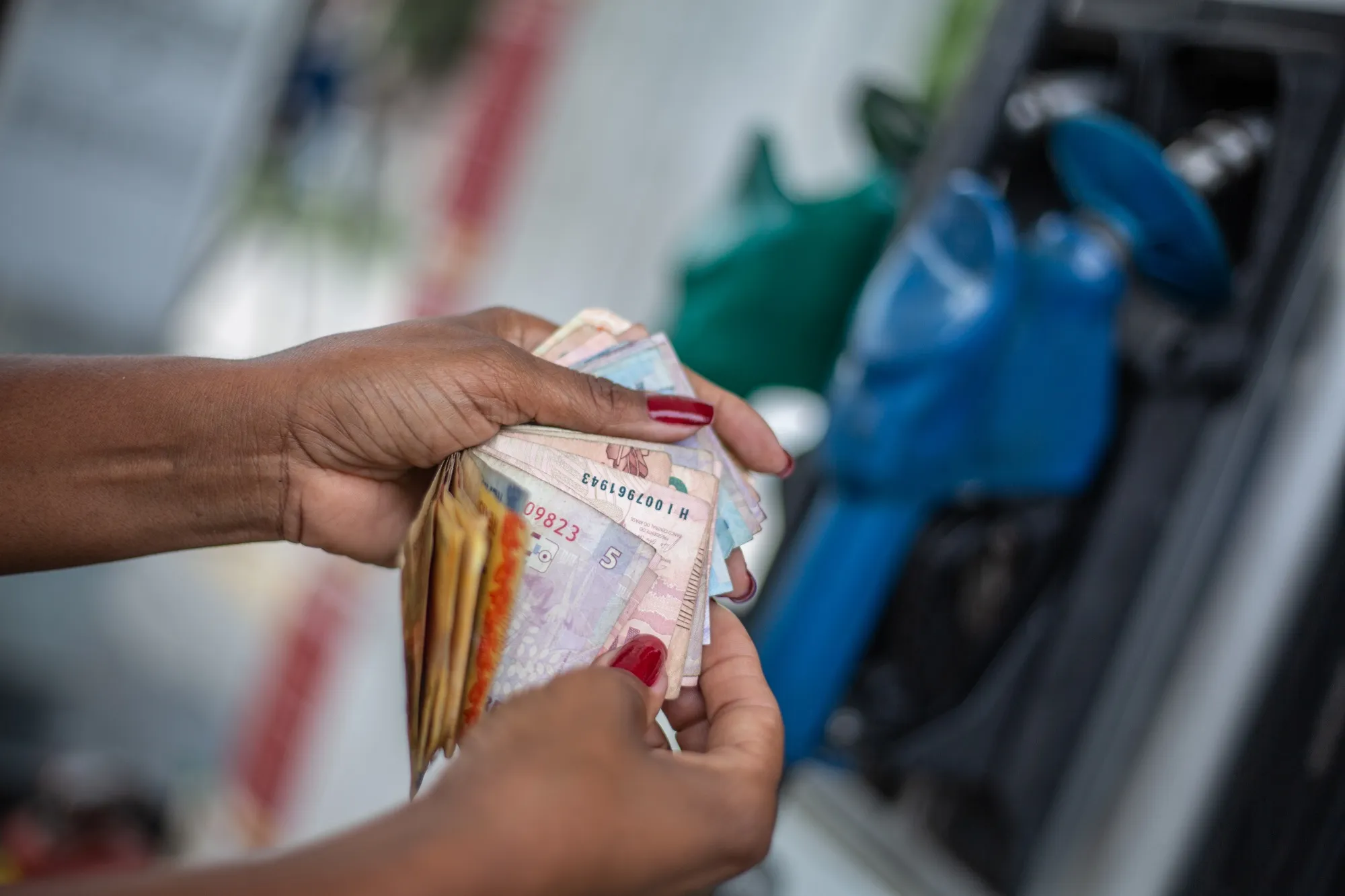 A worker checks real banknotes&nbsp;in Rio de Janeiro, Brazil.&nbsp;
