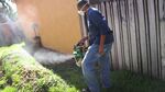 Larry Smart, a Miami-Dade County mosquito control inspector, uses a fogger to spray pesticide to kill mosquitos as the county fights a possible Zika virus outbreak on May 26, 2016, in Miami.

