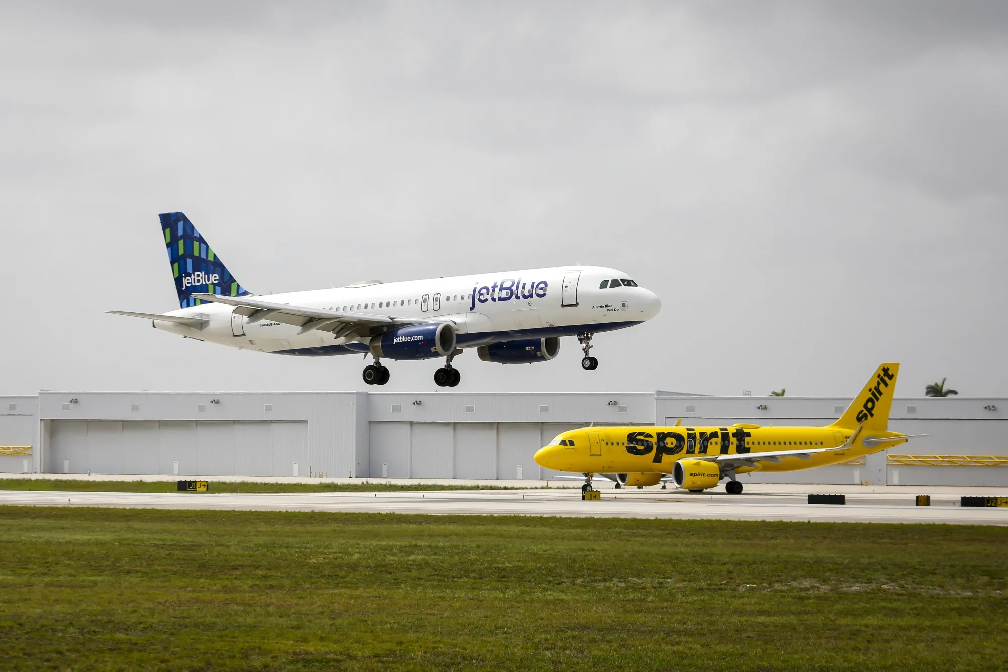 JetBlue and Spirit airplanes at Fort Lauderdale-Hollywood International Airport in Fort Lauderdale, Florida.