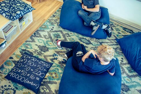 Students discuss a film during indoor recess at the Alamo Square AltSchool.