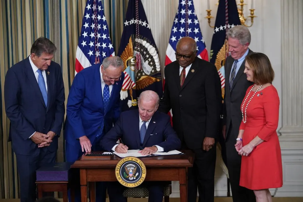 President Joe Biden signing&nbsp;the Inflation Reduction Act into law in August 2022.
