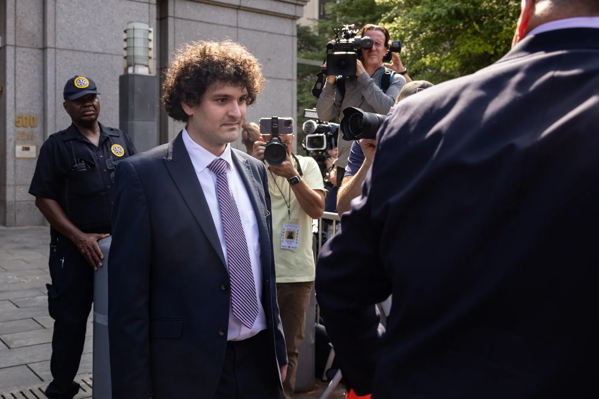 Sam Bankman-Fried, co-founder of FTX Cryptocurrency Derivatives Exchange, leaves court in New York, US, on Wednesday, July 26, 2023.