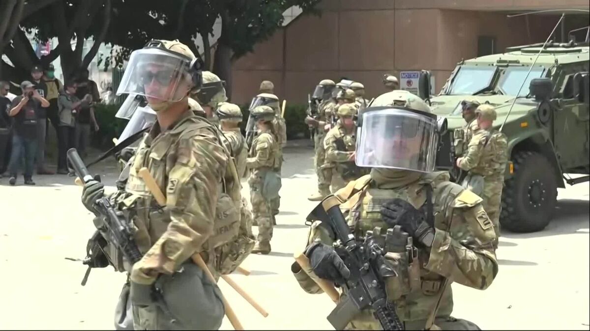 National Guard Troops Line up in Front of LA Protestors