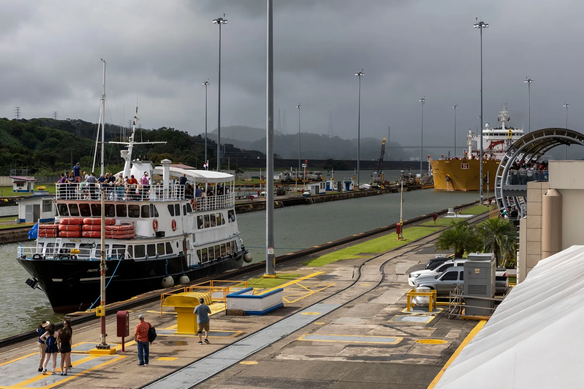 A passenger ship and the Stolt Lotus tanker ship navigate through the Miraflores locks of the Panama Canal near Panama City, Panama, on Sunday, Dec. 22, 2024. 