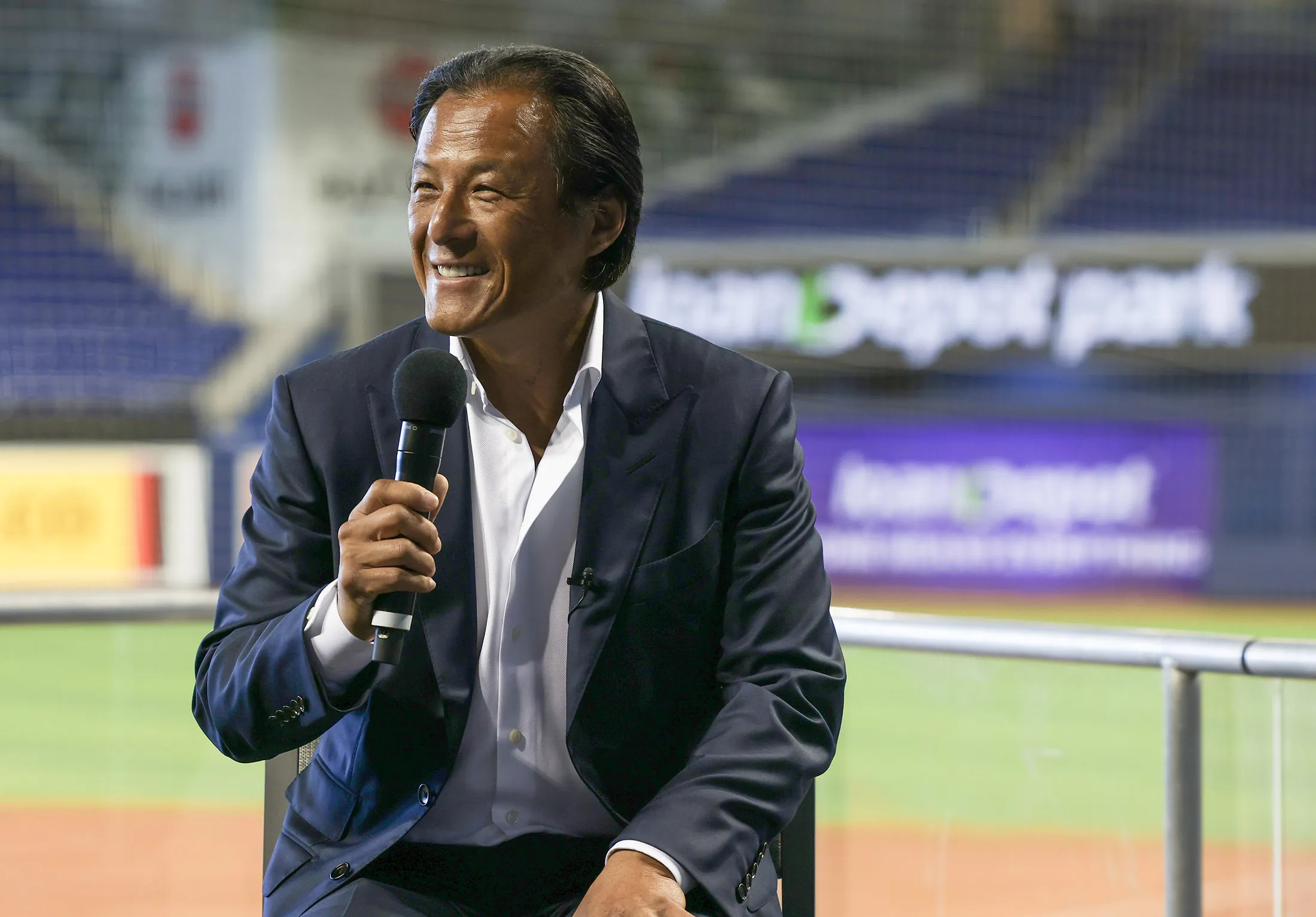 Anthony Hsieh announces LoanDepot as the exclusive naming rights partner for LoanDepot Park, home of the Miami Marlins, in Miami on March 31.
