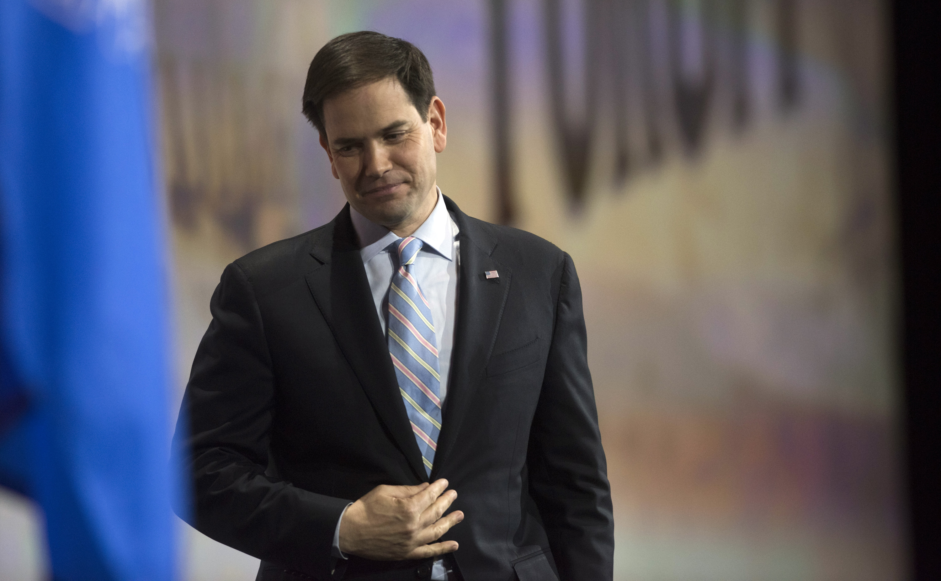 Senator Marco Rubio, a Republican from Florida, exits after speaking during the Leadership Forum at the 144th National Rifle Association Annual Meetings and Exhibits in Nashville, Tennessee, on April 10, 2015.
