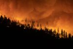The Dixie Fire burns on a mountain ridge near Greenville, California, on Aug. 5.