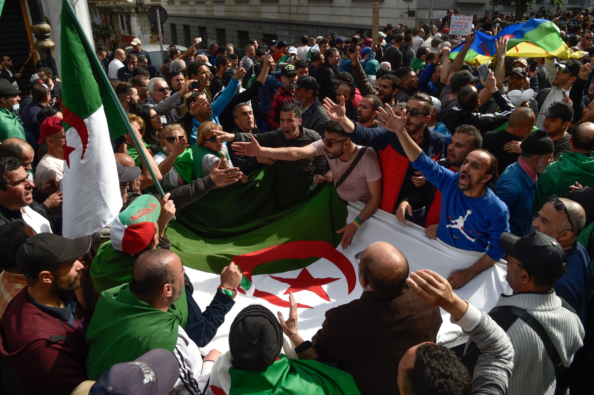 Algerian protesters gather during a weekly antigovernment demonstration in the capital,&nbsp;Algiers,&nbsp;on March 13.