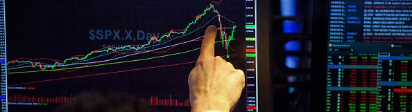 Trading On The Floor Of The NYSE As U.S. Stocks Head For Best Weekly Gain Since 2011