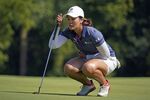 Xiyu Janet Lin, of China, lines up a a putt on the 18th green during the third round of the Dana Classic LPGA golf tournament Saturday, Sept. 3, 2022, at Highland Meadows Golf Club in Sylvania, Ohio. (AP Photo/Gene J. Puskar)