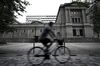 A cyclist rides past the Bank of Japan (BOJ) headquarters in Tokyo, Japan, on Monday, Sept. 14, 2020. The Bank of Japan left its bond-purchase amount unchanged at a regular operation on Monday.