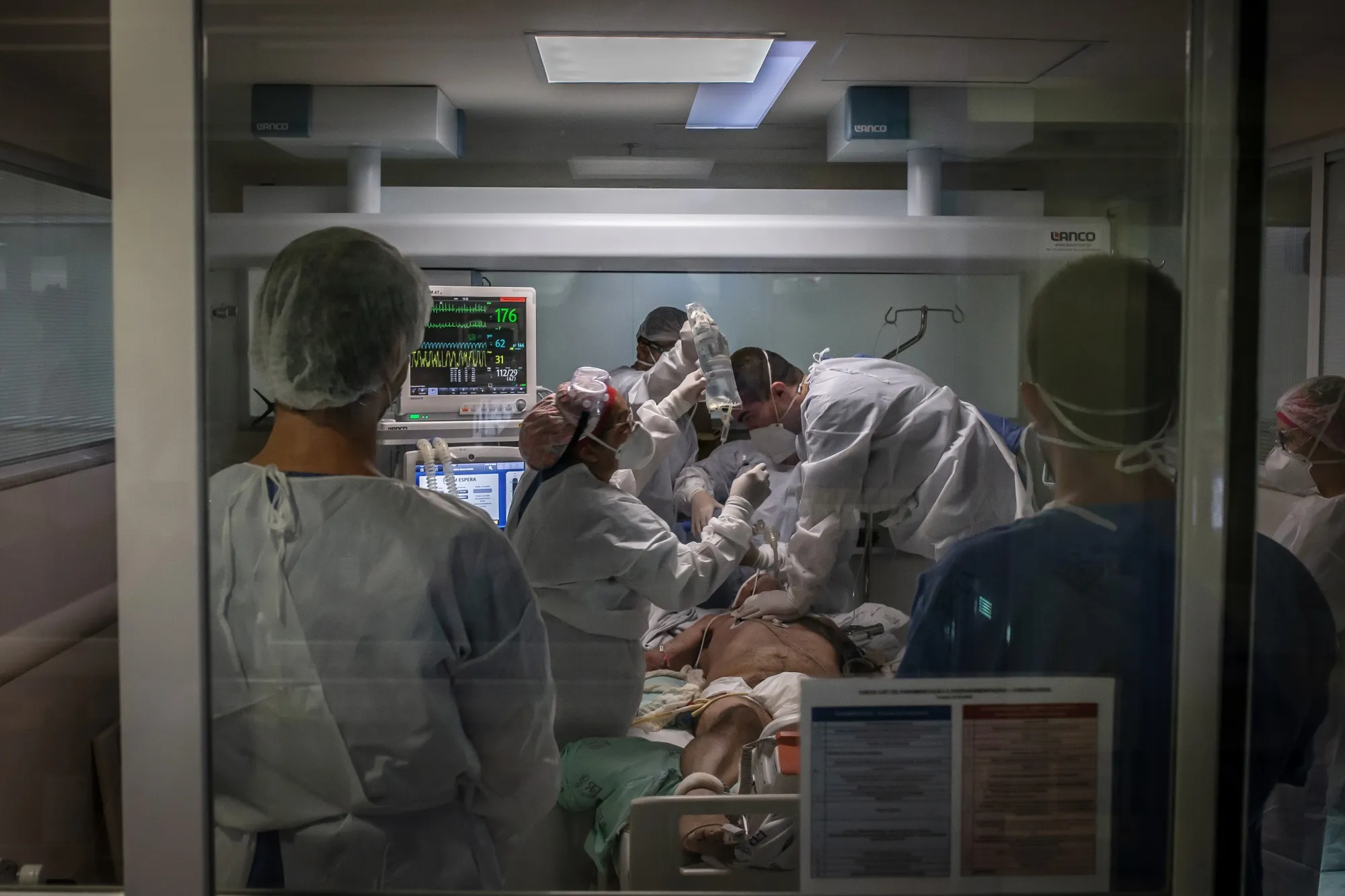 Doctors and nurses work to resuscitate a patient in the Covid-19 ICU at the Emilio Ribas Institute of Infectious Disease hospital in Sao Paulo on Dec. 4.