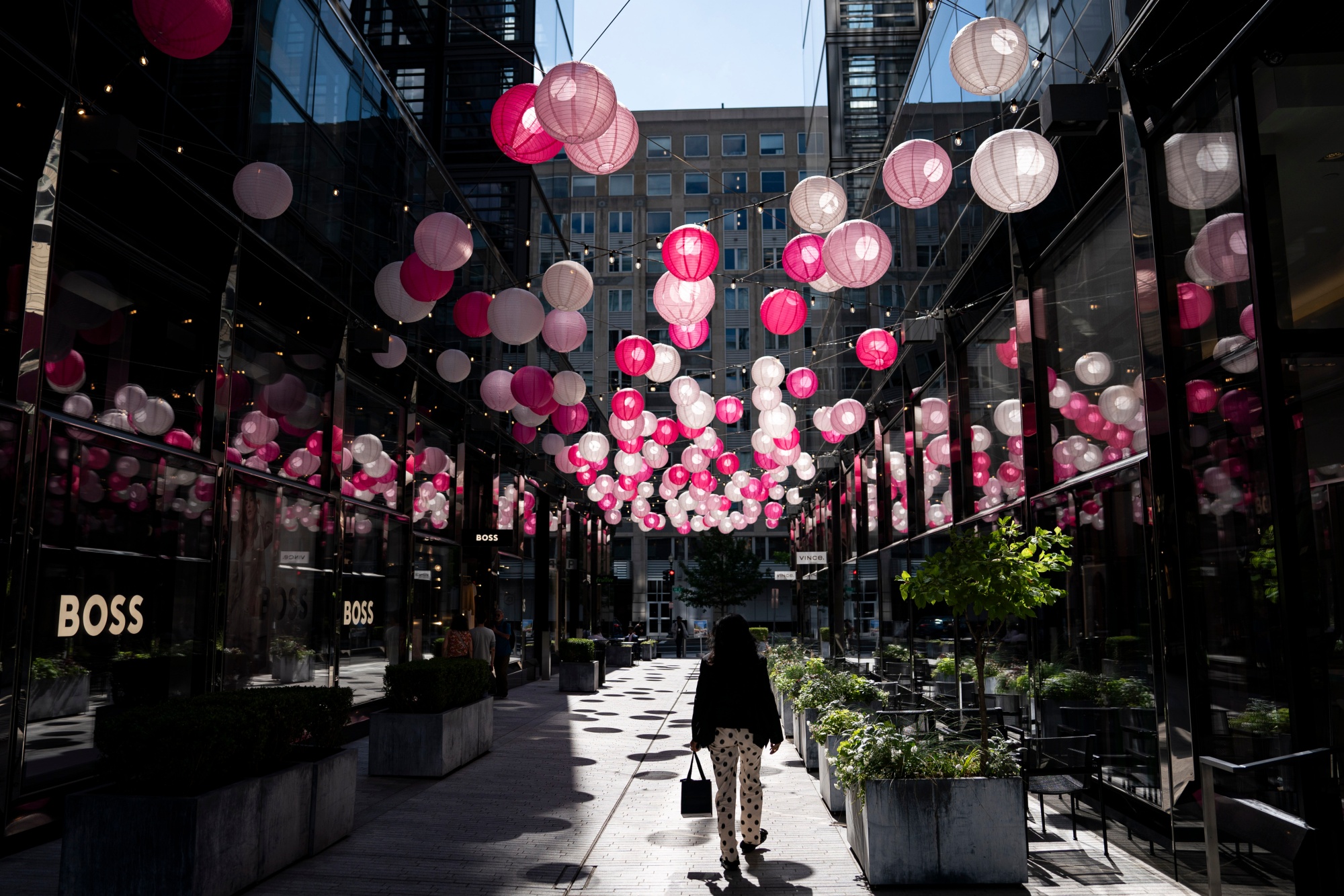 US consumers have helped the economy keep percolating. Above: A pedestrian in Washington’s CityCenter luxury development.