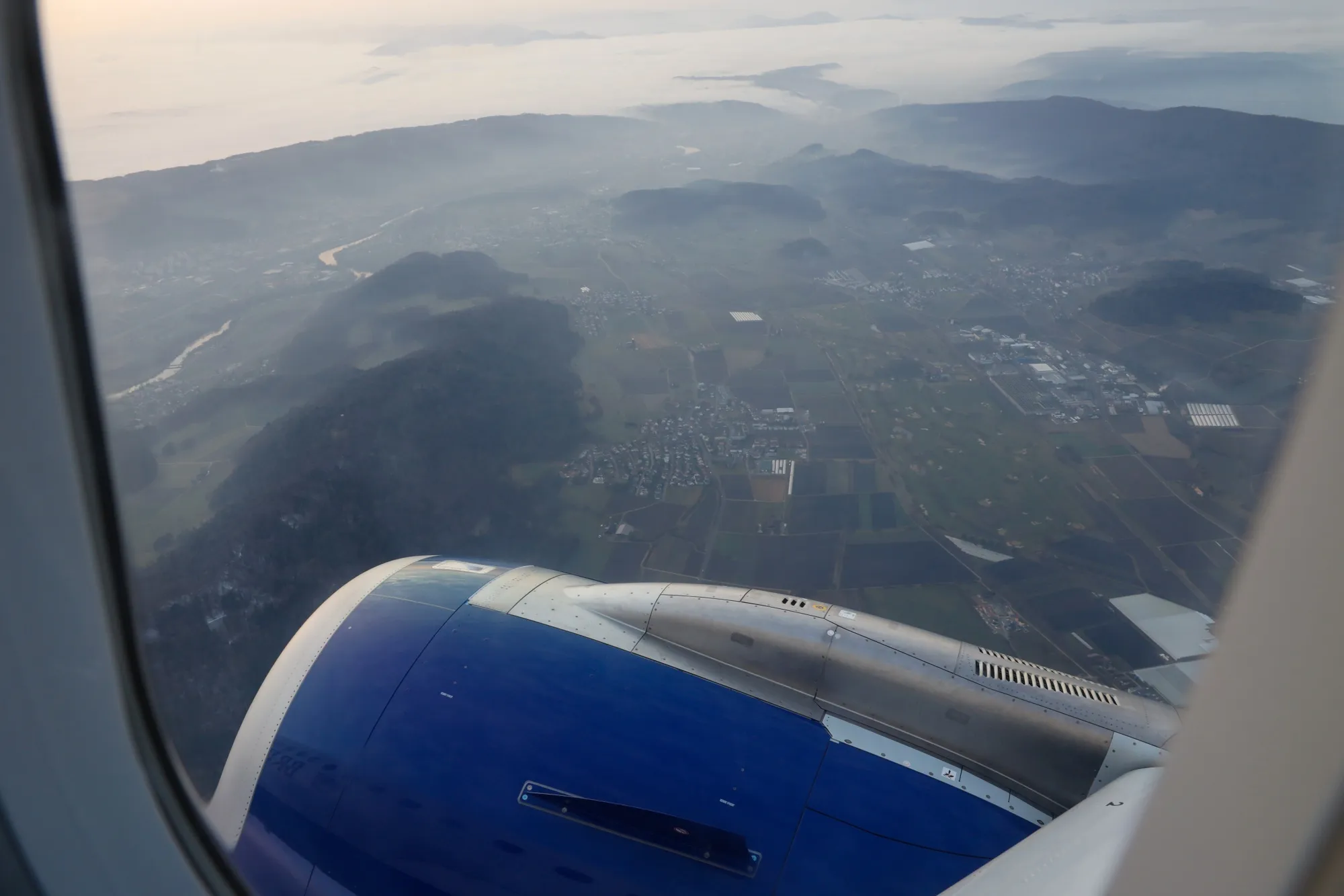Fog shrouds hills near Zurich.