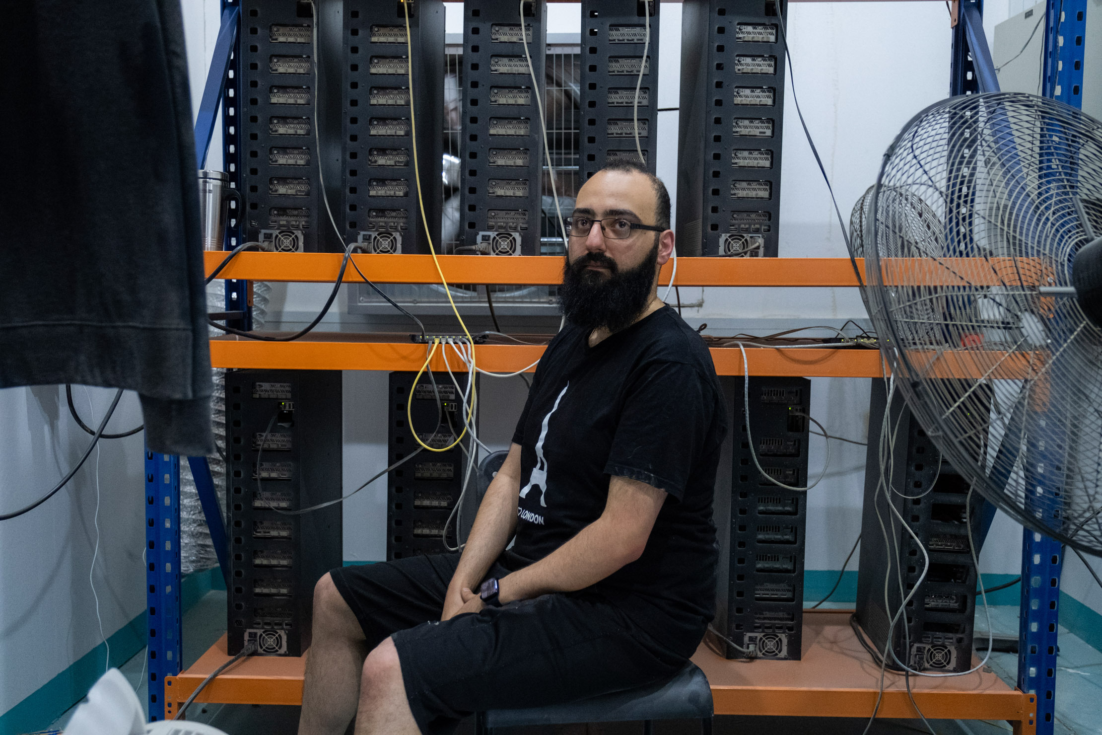 Mikel-Angelo Chalfoun, an Ethereum miner in a warehouse room that houses his graphic cards in Dubai.