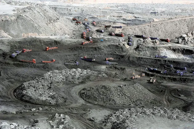 Trucks line up at the Buya Coal Mine in the Xinjiang region