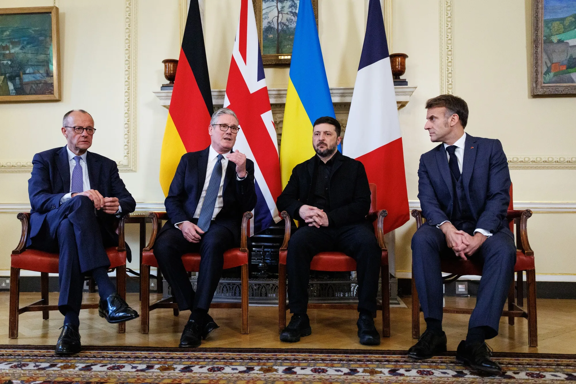 Friedrich Merz, Keir Starmer, Volodymyr Zelenskiy, and Emmanuel Macron held talks on the Ukraine war in London on Dec. 8.