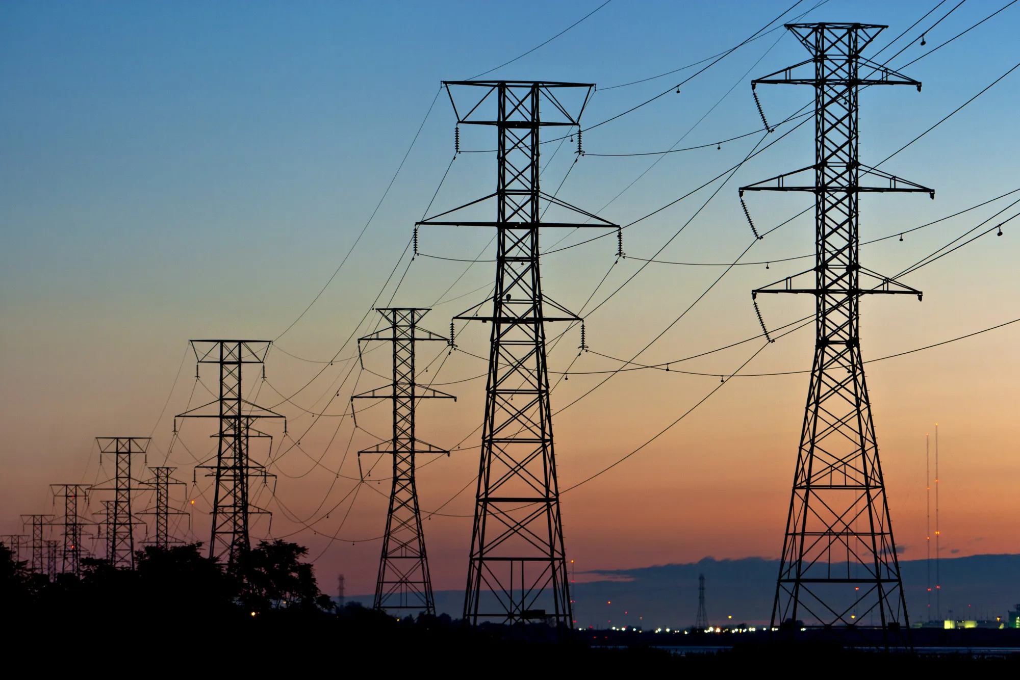 Power transmission lines are suspended from electricity pylons in Kearny, New Jersey, U.S.