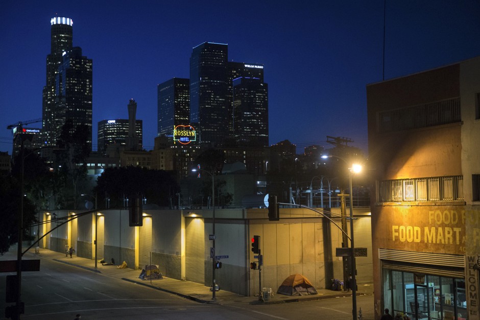 Homeless people sleep in tents in the Skid Row area of downtown L.A., where Eubanks conducted her research on the coordinated entry system—framed as the Match.com of homeless services.