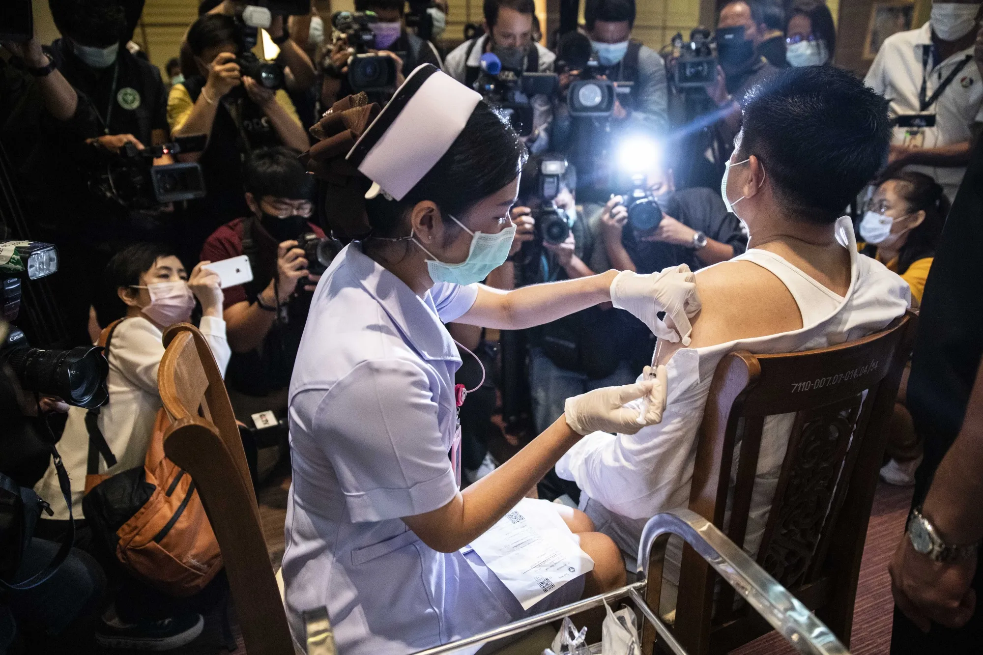 A nurse administers a dose of Sinovac Biotech Ltd.’s vaccine in Nonthaburi, Thailand.