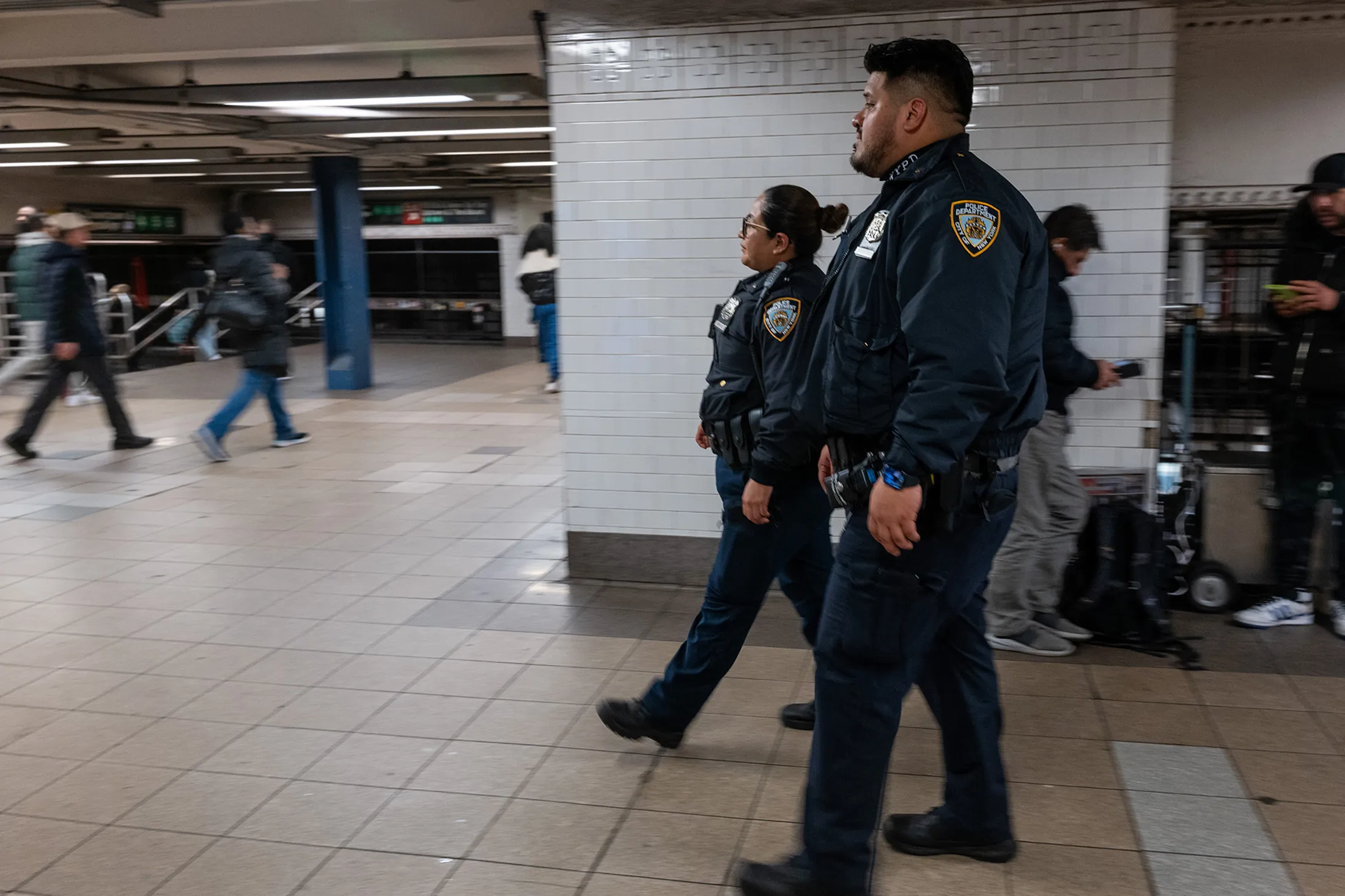 New York Police Department officers patrol a subway station in New York&nbsp;on March 6.