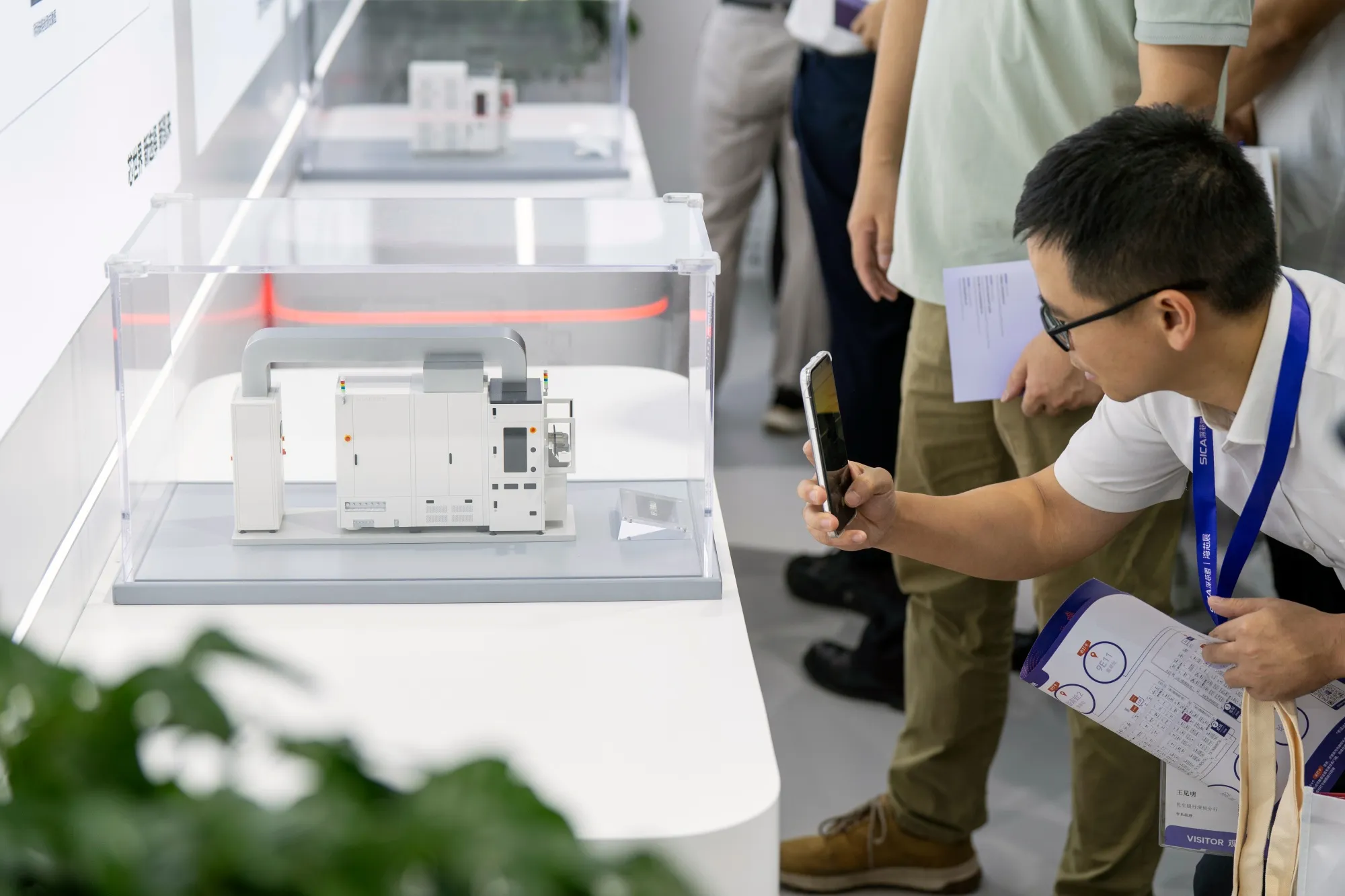 A model of semiconductor equipment at the Shenzhen SiCarrier Technologies Co. booth at a semiconductor conference in Shenzhen on Oct. 15.