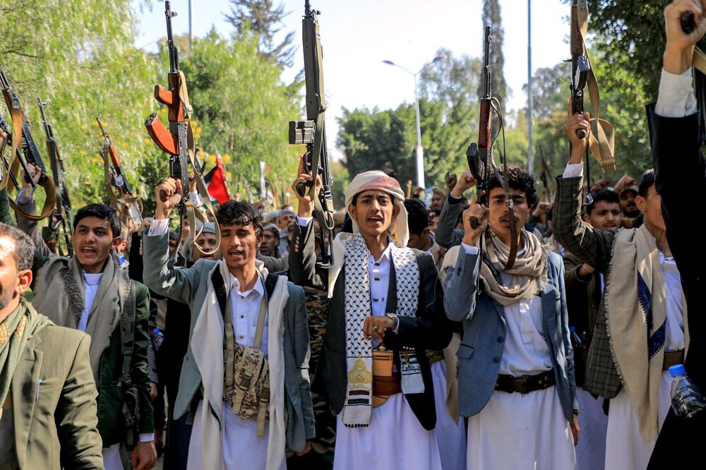 Armed supporters of Houthi rebels attend a rally in Yemen.