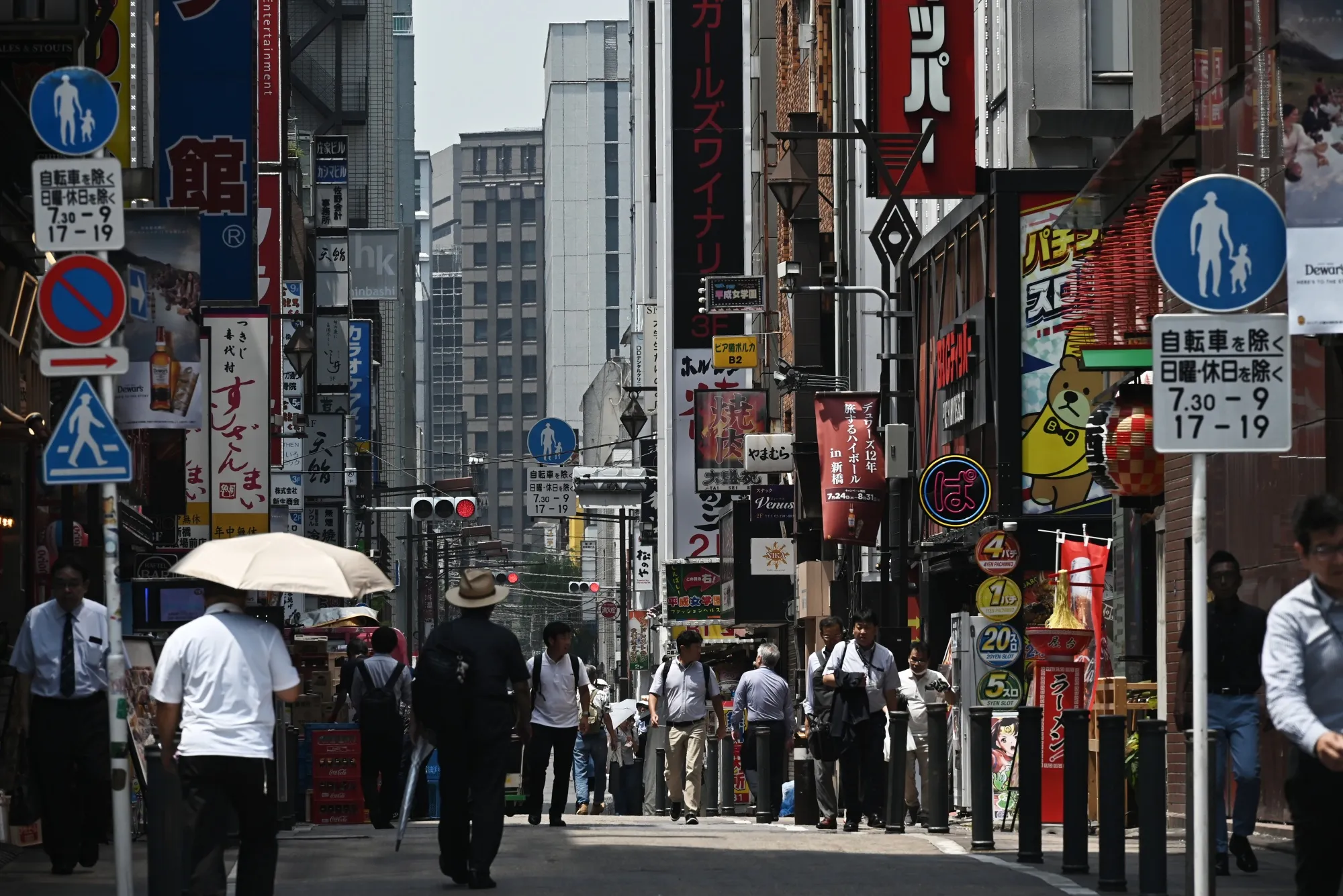Pedestrians&nbsp;in Tokyo on&nbsp;Aug. 6.